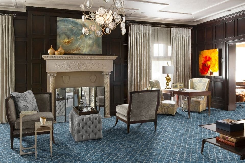 patterned blue carpet in a formal traditional living room
